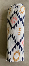 Load image into Gallery viewer, Organic Cotton Muslin Baby Swaddle Cloth with geometric aztec pink and black pattern on white.
