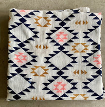 Load image into Gallery viewer, Organic Cotton Muslin Baby Swaddle Cloth with geometric aztec pink and black pattern on white.
