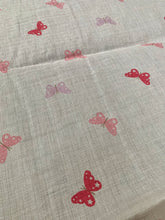 Load image into Gallery viewer, Organic Cotton Muslin Baby Swaddle Cloth with pink and lilac butterflies on white. 
