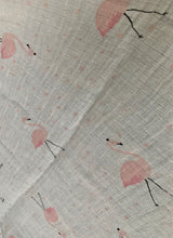 Load image into Gallery viewer, Organic Cotton Muslin Baby Swaddle Cloth with delicate pink flamingo pattern on white.
