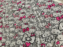 Load image into Gallery viewer, Organic Cotton Muslin Baby Swaddle Cloth with Pink and Black Hello kitty pattern on white.
