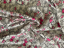 Load image into Gallery viewer, Organic Cotton Muslin Baby Swaddle Cloth with Pink and Black Hello kitty pattern on white.
