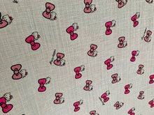 Load image into Gallery viewer, Organic Cotton Muslin Baby Swaddle Cloth with Pink Hello kitty and bows pattern on white.
