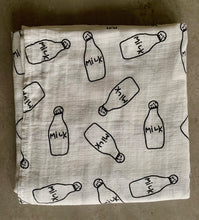 Load image into Gallery viewer, Organic Cotton Muslin Baby Swaddle Cloth with Black milk bottle pattern on white.
