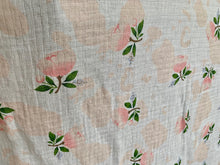 Load image into Gallery viewer, Organic Cotton Muslin Baby Swaddle Cloth with delicate floral pink/peach rose and cotton pattern on white.
