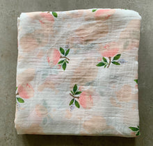 Load image into Gallery viewer, Organic Cotton Muslin Baby Swaddle Cloth with delicate floral pink/peach rose and cotton pattern on white.
