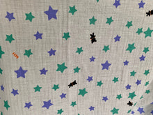 Load image into Gallery viewer, Organic Cotton Muslin Baby Swaddle Cloth with varying sizes of small green and blue stars and small black bears pattern on white.
