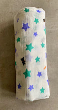 Load image into Gallery viewer, Organic Cotton Muslin Baby Swaddle Cloth with varying sizes of small green and blue stars and small black bears pattern on white.
