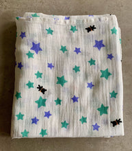 Load image into Gallery viewer, Organic Cotton Muslin Baby Swaddle Cloth with varying sizes of small green and blue stars and small black bears pattern on white.
