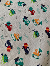 Load image into Gallery viewer, Organic Cotton Muslin Baby Swaddle Cloth with colourful car, mixer and digger print on white.
