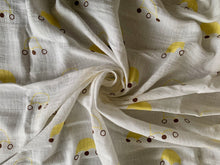 Load image into Gallery viewer, Organic Cotton Muslin Baby Swaddle Cloth with yellow and brown crown print on white.
