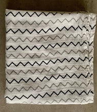 Load image into Gallery viewer, Organic Cotton Muslin Baby Swaddle Cloth with black and grey zigzag print on white.
