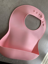 Load image into Gallery viewer, Silicone Bib BPA Free in blush light pink colour and 4 buttons with large crumb catcher scoop.
