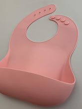 Load image into Gallery viewer, Silicone Bib BPA Free in blush light pink colour and 4 buttons with large crumb catcher scoop.
