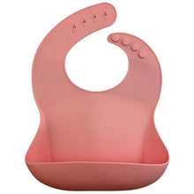 Load image into Gallery viewer, Silicone Bib BPA Free in blush light pink colour and 4 buttons with large crumb catcher scoop.
