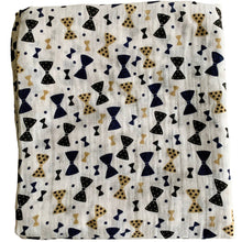 Load image into Gallery viewer, Organic Cotton Muslin Cloth Swaddle with black and gold bows varying sizes on white. 
