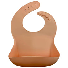 Load image into Gallery viewer, Silicone Bib BPA Free in light peach/butternut squash colour and 4 buttons with large crumb catcher scoop.
