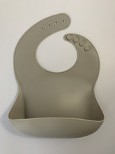 Load image into Gallery viewer, Silicone Bib BPA Free in a medium grey colour and 4 buttons with large crumb catcher scoop.
