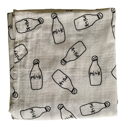 Organic Cotton Muslin Baby Swaddle Cloth with Black milk bottle pattern on white.