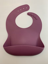 Load image into Gallery viewer, Silicone Bib BPA Free in a deep wine/maroon colour and 4 buttons with large crumb catcher scoop.
