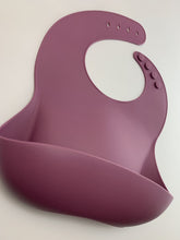 Load image into Gallery viewer, Silicone Bib BPA Free in a deep wine/maroon colour and 4 buttons with large crumb catcher scoop.
