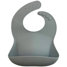 Load image into Gallery viewer, Silicone Bib BPA Free in a light blue/grey colour and 4 buttons with large crumb catcher scoop.
