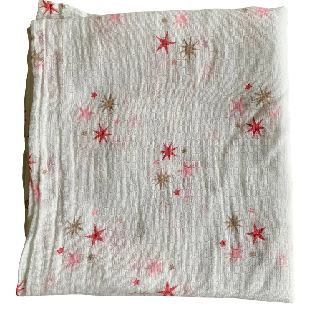 Organic Cotton Muslin Baby Swaddle Cloth with pink and gold star pattern on white.